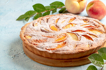 Peach pie with almond cream.