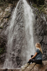 person and waterfall