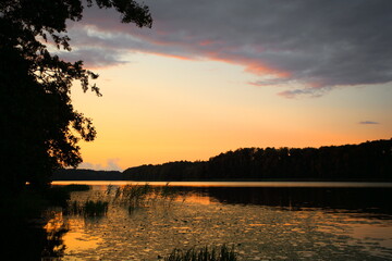 Lake Ruda Woda (Poland) in the light of setting sun