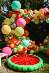 Fototapeta na wymiar photo zone with bright inflatable elements