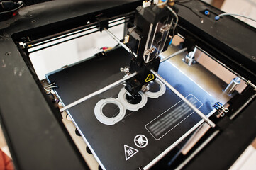The 3D printing machine operation at work.