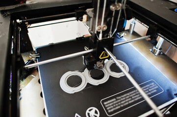 The 3D printing machine operation at work.