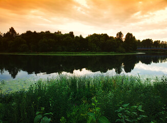 Sunset at summer river background