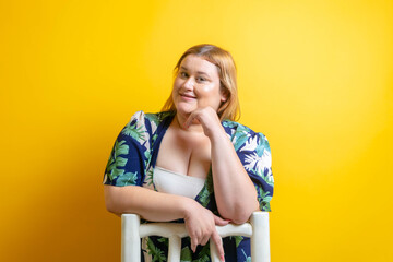 portrait of white fat young woman looking at camera