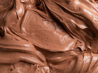 Chocolate flavour gelato - full frame detail. Close up of a brown surface texture of chocolate Ice...