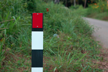 Red caution board in the side of the road