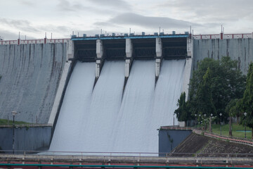 4 shutter dam with water flowing