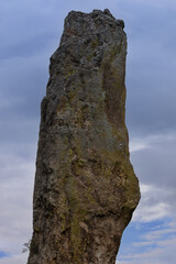 Granite rock column soars against sky along Needles Highway in Custer State Park in South Dakota, part of the American Midwest