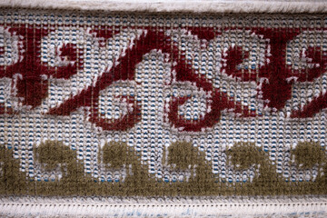 the Kazakh national pattern embroidered on fabric