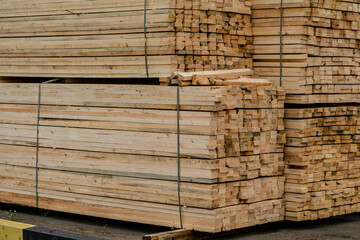 Stacks of timber ready for shipment in sea port in Ukraine