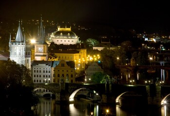 National Theater and bridges over the Vltava river in Prague at night