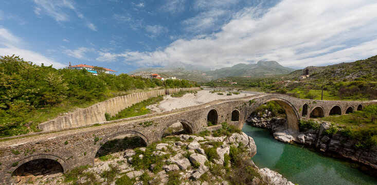 Historical arched Mesi Bridge near the city of Shkoder in Albania © MehmetOZB