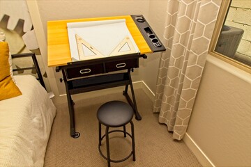 Adjustable Drafting Table In Modern Bedroom