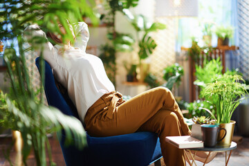 housewife with long wavy hair at home in sunny day