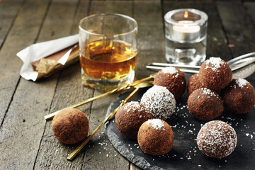 Chocolate rum balls with coconut.