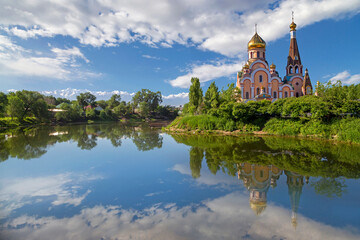 Russian orthodox church known as Church of exaltation of the holy cross and its reflection in Almaty, Kazakhstan