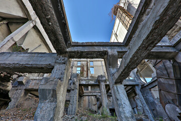 Fototapeta na wymiar Remains of abandoned uranium plant from Soviet era in Kaji Say, Kyrgyzstan