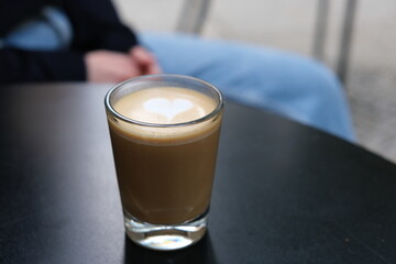 Glass of coffee with latte art