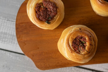 Baked snacks ​​- bread stuffed with pepperoni sausage