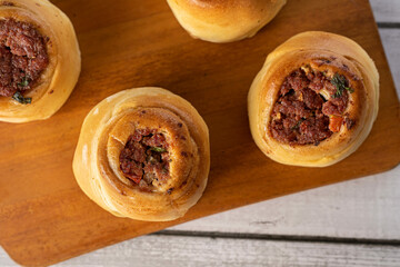 Baked snacks ​​- bread stuffed with pepperoni sausage