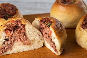 Baked snacks ​​- bread stuffed with pepperoni sausage