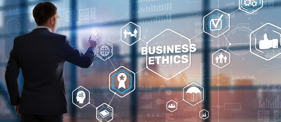 Business man writing business ethic concept on virtual screen