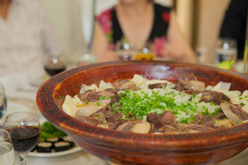 a plate of meat. restaurant in asia. national Kazakh dish