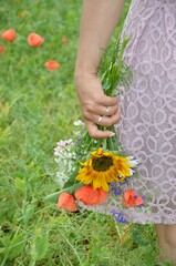 person picking flowers