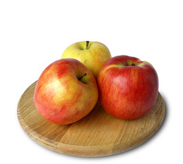 Three apples on a wooden stand