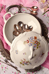 Antique tableware-terrine and cutlery, top view