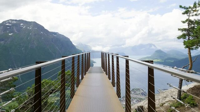 Observation Deck Of Rampestreken Overlooking The Fjord Amidst The Mountain Range In Aandalsnes, Norway. wide shot