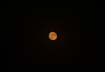 Orange Full Moon  in a Dark Sky