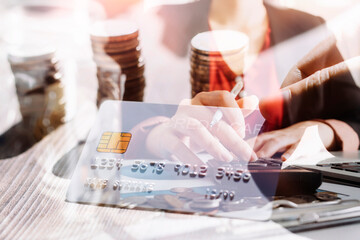 shopping online payment by using laptop.hands holding credit card and using laptop. online shopping concept.