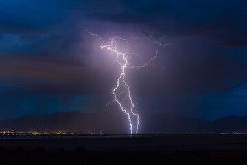 Thunderstorm with lightning bolts over Salt Lake City, Utah