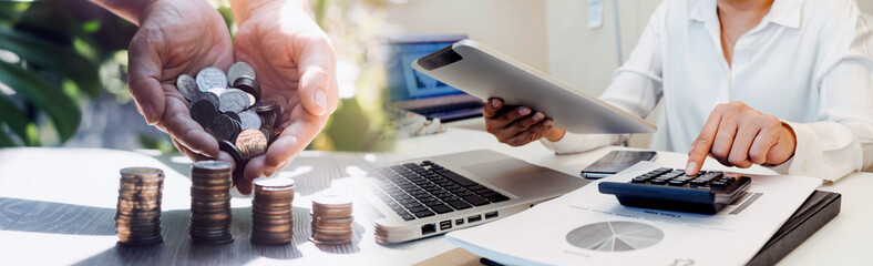 stacking money coins and a house model.save and investment for buy house concept .for the...