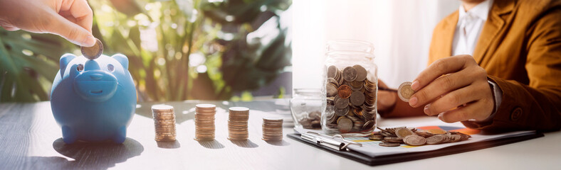 stacking money coins and a house model.save and investment for buy house concept .for the...