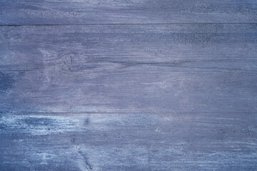 Wood texture with a shabby blue paint. Top view, copy space