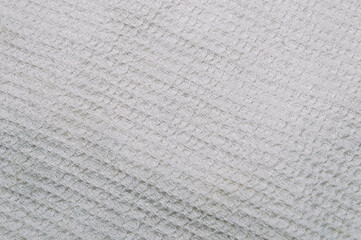 the texture is light gray, waffle embossing, uneven surface of the cotton material