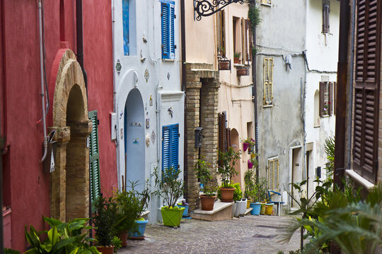Colorful street in the town of Ripatransone in Italy