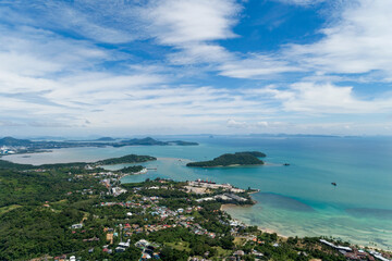 Fototapeta premium High angle view Phuket island and harbor located in Phuket Thailand aerial view drone top down Amazing nature view landscape Beautiful sea surface.