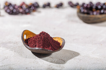 acai fruits and powder, the Amazon fruit with antioxidant powers - Euterpe oleracea
