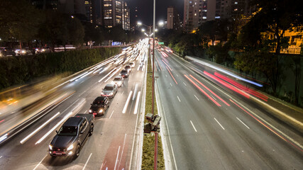 Fototapeta na wymiar Sao Paulo, Brazil, July 19, 2021. Motion lapse of traffic jan on 23 de Maio Avenue at night, in south side of Sao Paulo city.