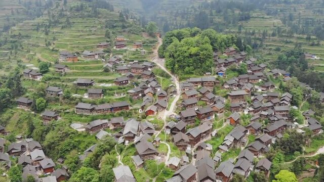 Aerial view of traditional wooden building cluster of Xijiang Qianhu Miao Village (The One Thousand Household Miao Village) , in southeastern Guizhou province of China.