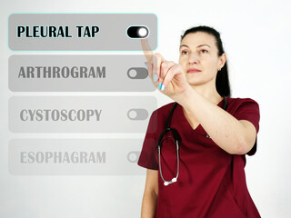  PLEURAL TAP inscription on the screen. Close up Doctor hands holding black smart phone.