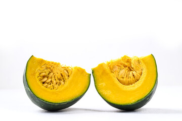 Sliced green pumpkin on white background, Japanese pumpkin