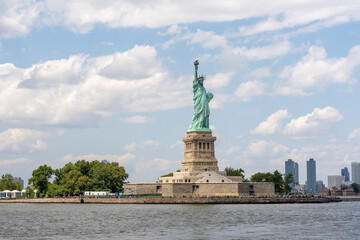 New York, NY - USA - July 30, 2021: Horizontal view of the Statue of Liberty, a colossal neoclassical sculpture on Liberty Island in New York Harbor within New York City. - obrazy, fototapety, plakaty