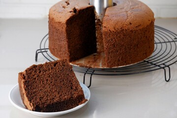 cut and eat a delicious chocolate chiffon cake