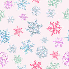 Seamless pattern of complex Christmas snowflakes in various colors on white background