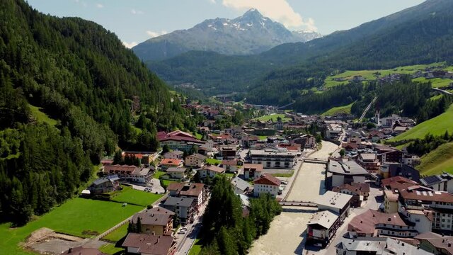 Flight over the village of Soelden in Austria - Solden from above - travel photography by drone