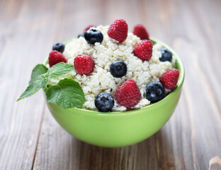 Cottage cheese with fresh rasberries and blueberries